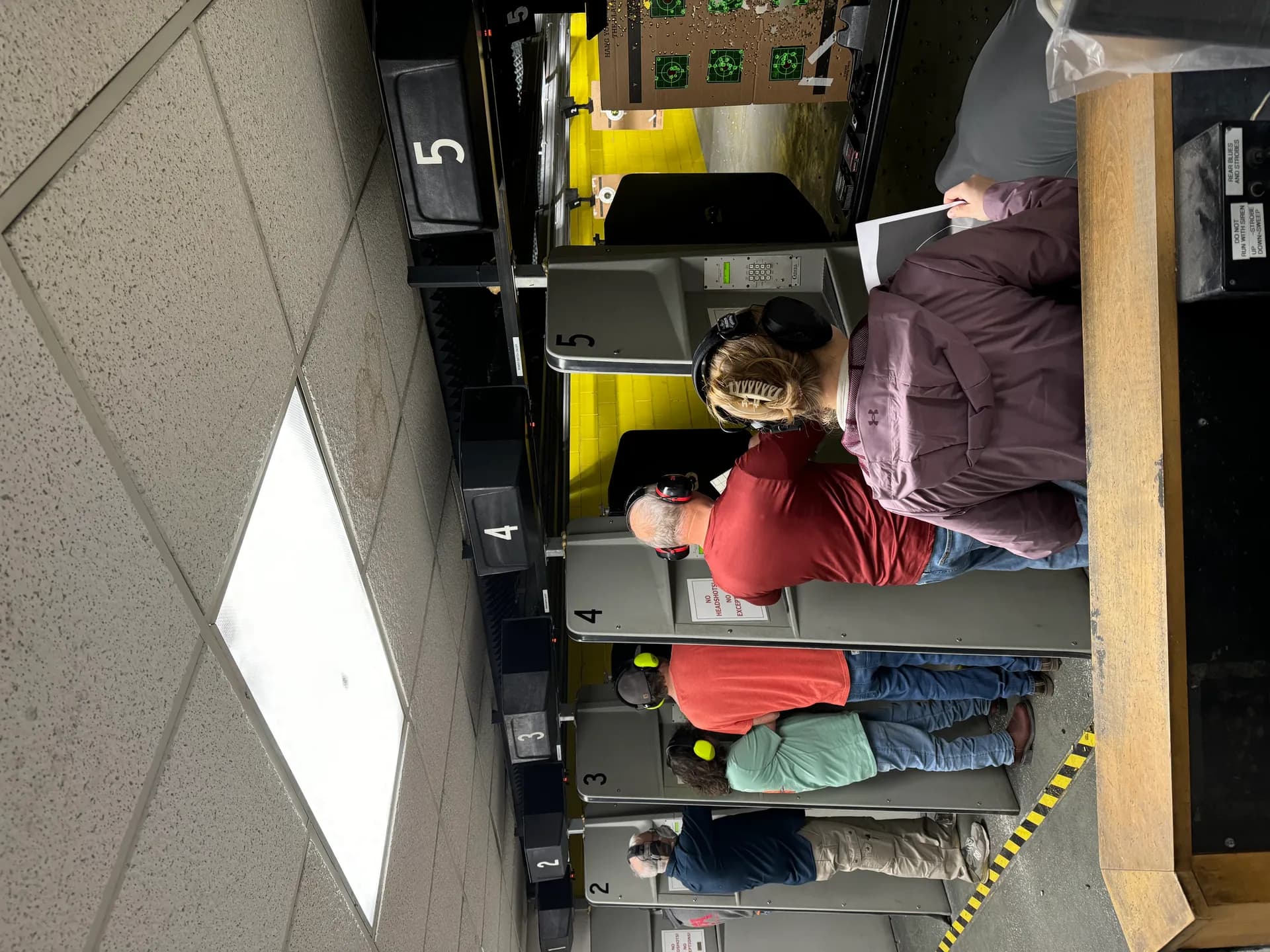 Shooters practicing in the indoor shooting bays at Lowcountry Guns
